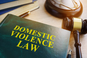 Domestic violence law book and gavel
